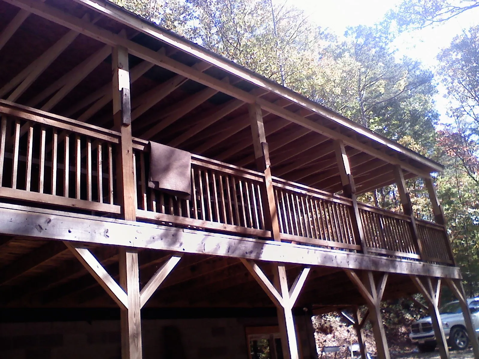 Timber framing under a new elevated porch and deck — Roof Leak Repair in Waveland by Roofing Brothers
